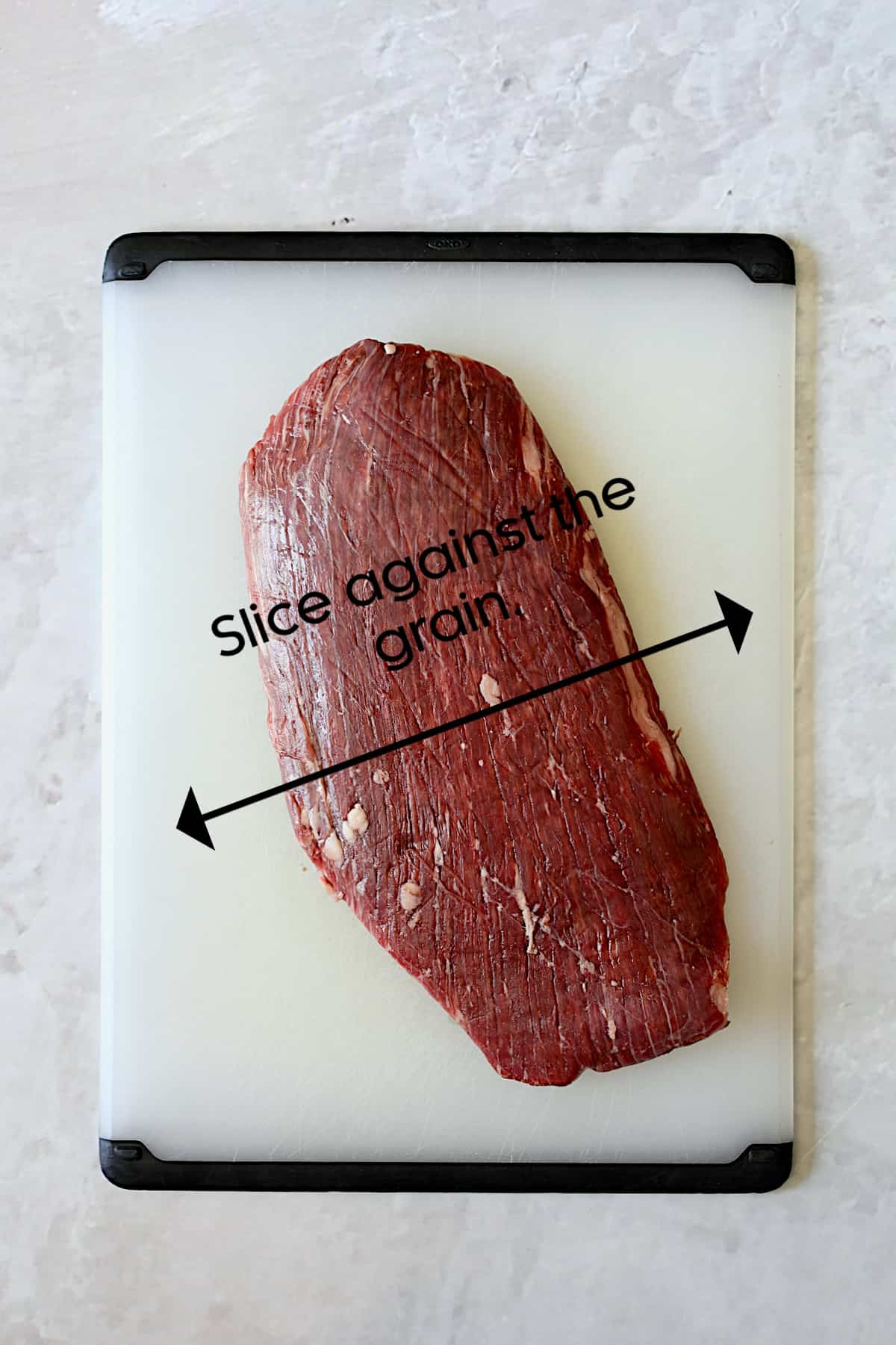 How to slice a flank steak agains the grain.
