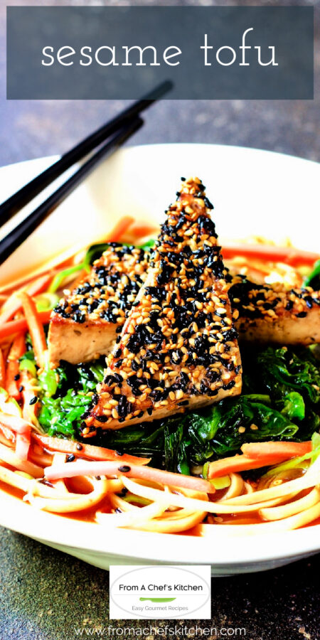 Pinterest graphic for Sesame Tofu showing it over rice noodles and spinach in white bowl witih black chopsticks.