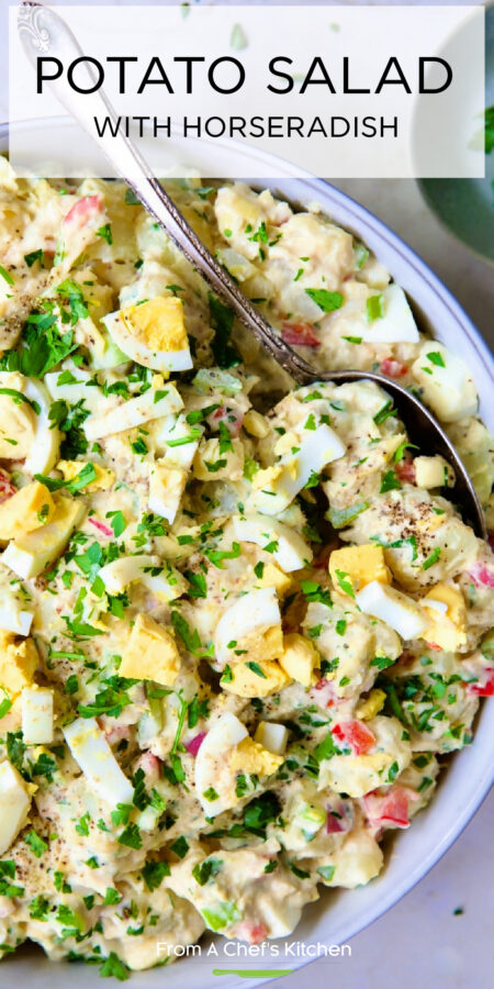 Pinterest graphic for Potato Salad with Horseradish showing it in a serving bowl with serving spoon.