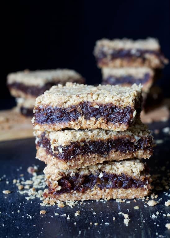 Stack of three date bars with more stacks of date bars in the background.