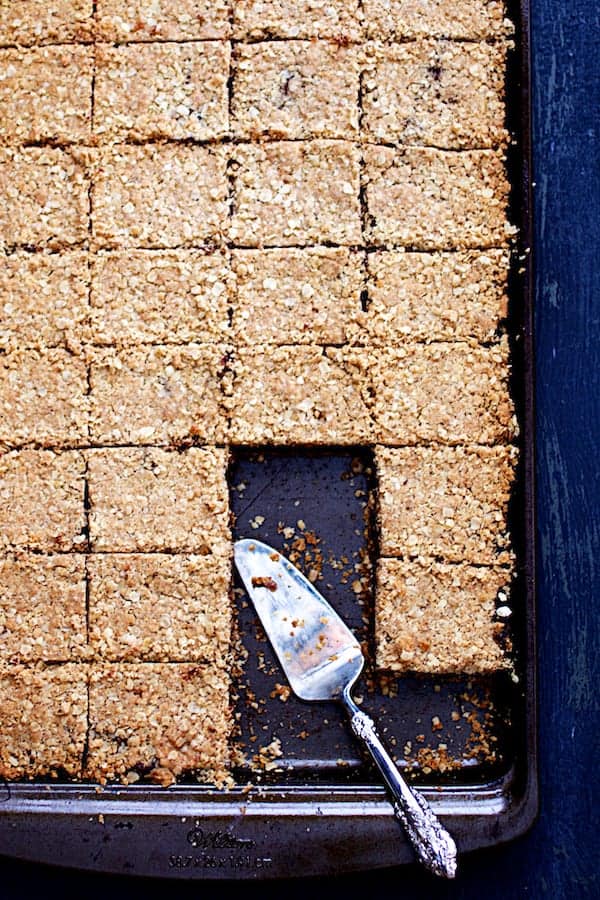 Photo of Healthier Date Bars in baking pan with server.