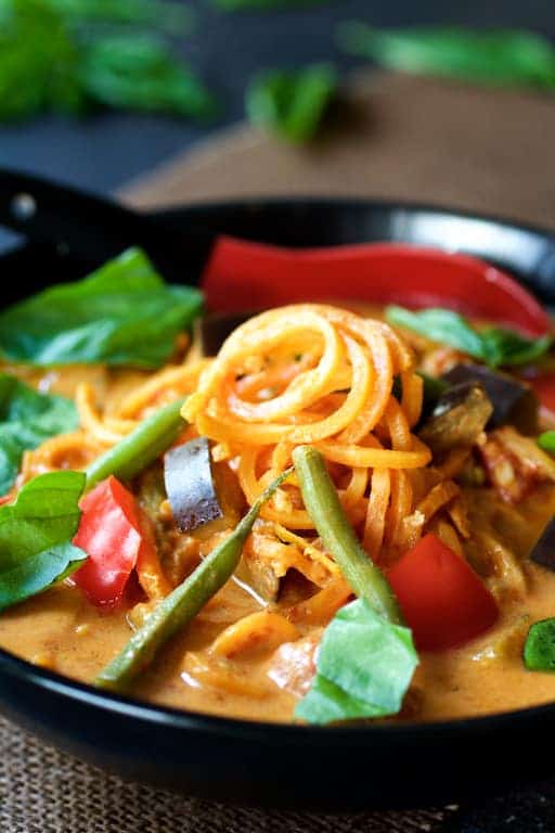 Close-up photo of Vegetables in Thai Red Curry with Sweet Potato Noodles.