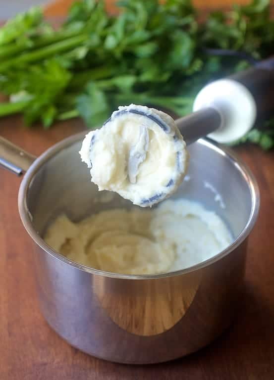 Photo of Celery Root Puree being pureed with immersion blender.