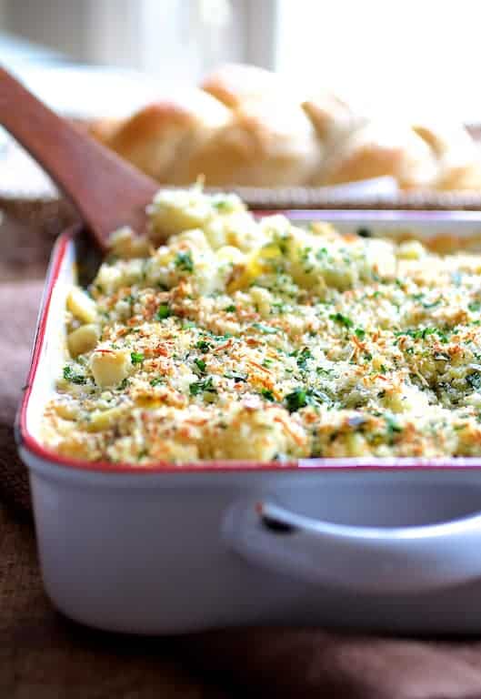 Photo of Baked Orecchiette with Cauliflower, Bacon and Taleggio in white baking dish.