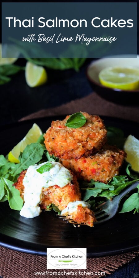 Pinterest graphic for Thai Salmon Cakes showing three cakes stacked and one cut into with mayonnaise on it.