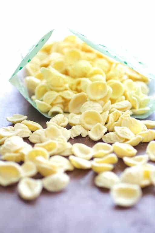Photo of orecchiette spilling out of bag.