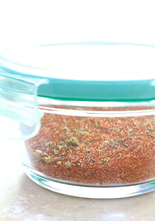 Photo of blackening mix in glass container.