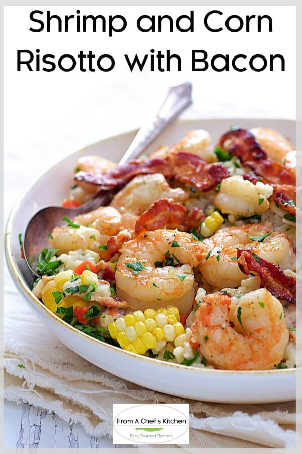 Pinterest graphic for Shrimp and Corn Risotto with Bacon showing one serving in a white bowl with serving spoon.