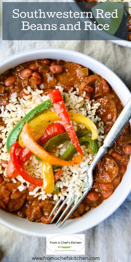 Pinterest graphic for Southwestern Red Beans and Rice showing one serving topped with colorful bell peppers in an earthenware bowl.
