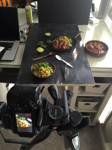 Photo showing behind the scenes of taking a food photo.