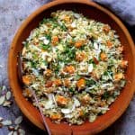 Lemony Quinoa with Roasted Butternut Squash Almonds and Parmesan Cheese in wood bowl.
