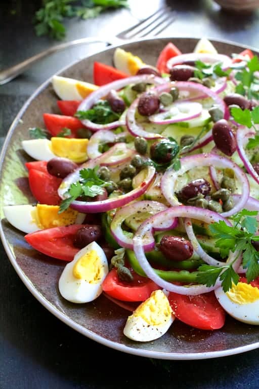 Photo of Tunisian Salad Platter (Assiette Tunisienne) on gray-rimmed platter.