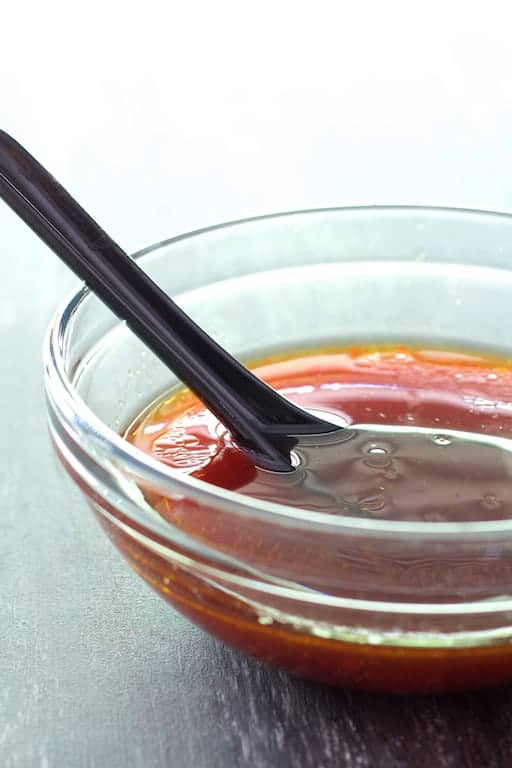Photo of dressing for Vietnamese Spring Roll Salad in glass bowl.