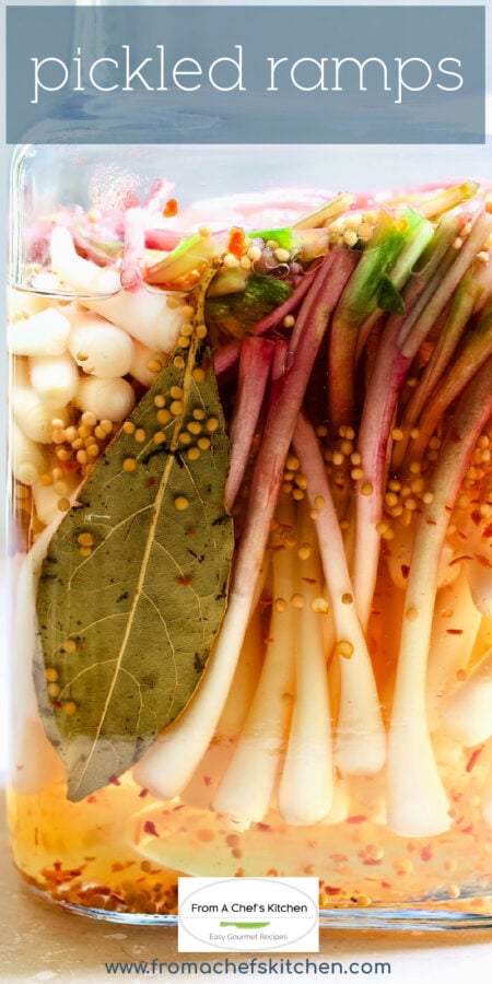 Pinterest graphic for Pickled Ramps showing then in a square jar floating in the brine.