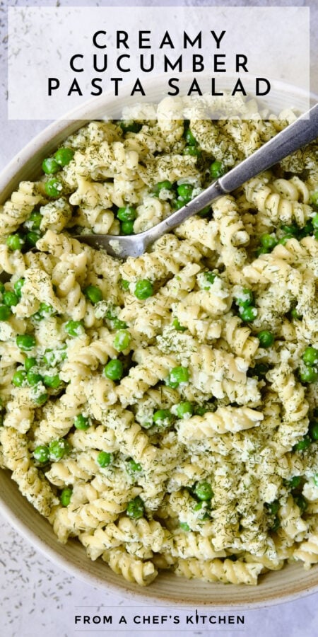 Pinterest graphic for Creamy Cucumber Pasta Salad showing it in a white serving bowl with serving spoon.