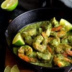 Shrimp in Avocado Butter in cast iron skillet.