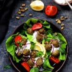 Turkish Turkey Meatball Wraps and all the accompaniments in brown ceramic bowl.