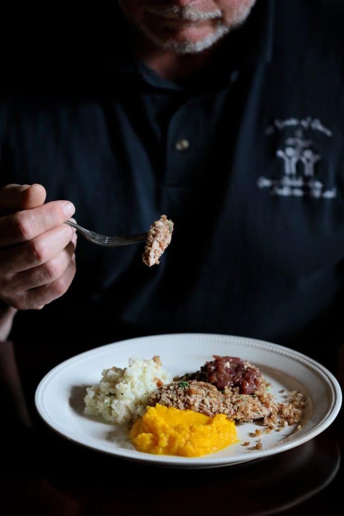 Photo of diner enjoying the dish.
