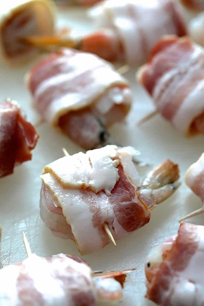 Photo of bacon-wrapped shrimp before cooking.