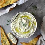 White Bean and Artichoke Spread with Rosemary Sea Salt Flatbread Chips.