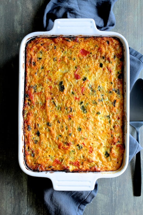 Photo of Spaghetti Squash Poblano Chorizo Breakfast Casserole on blue towel.