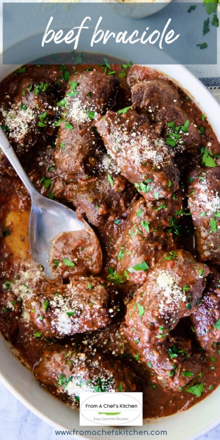 Pinterest graphic for Beef Braciole showing it in a white oval dish with silver serving spoon.