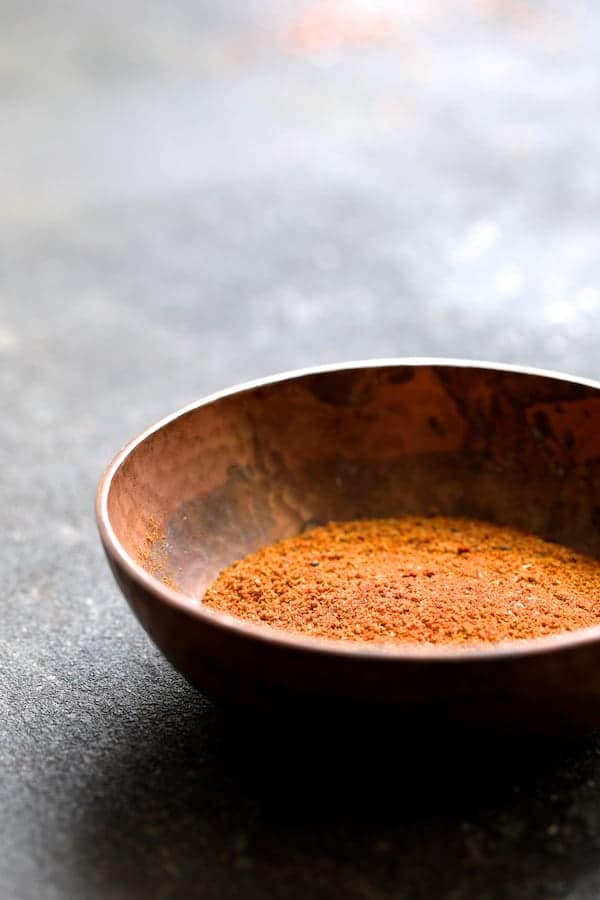 Photo of copper bowl of Madras curry powder.