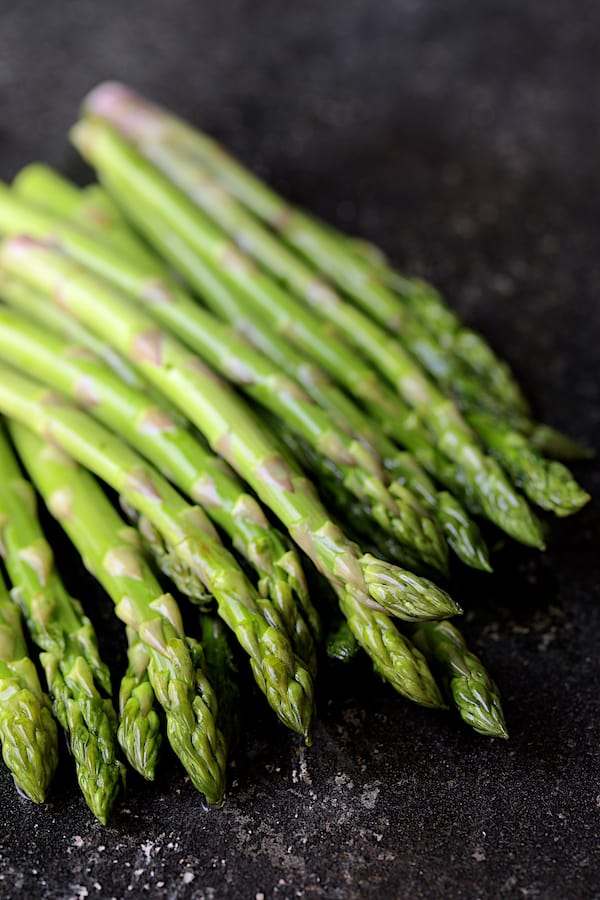Photo of fresh uncooked fresh asparagus.