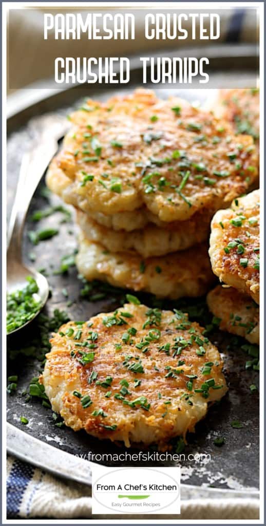 Pinterest graphic for Parmesan Crusted Crushed Turnips showing them on a metal platter garnished with chopped chives.