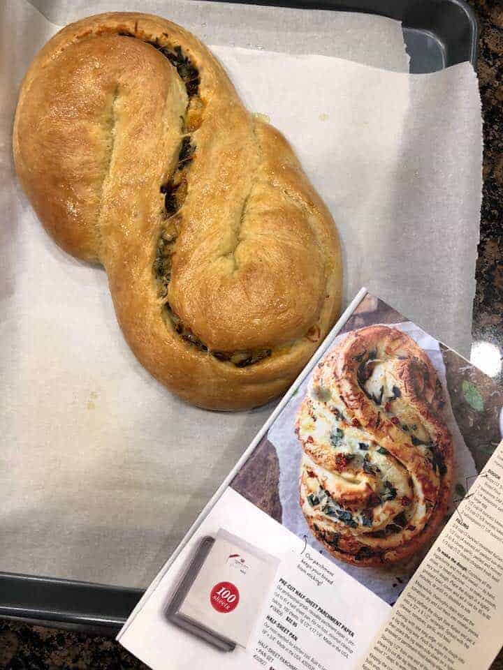 Photo of baked bread with a photo the recipe.