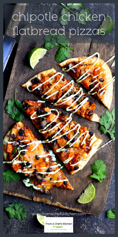 Chipotle Chicken Flatbread Pizza on wood cutting board cut into four pieces.