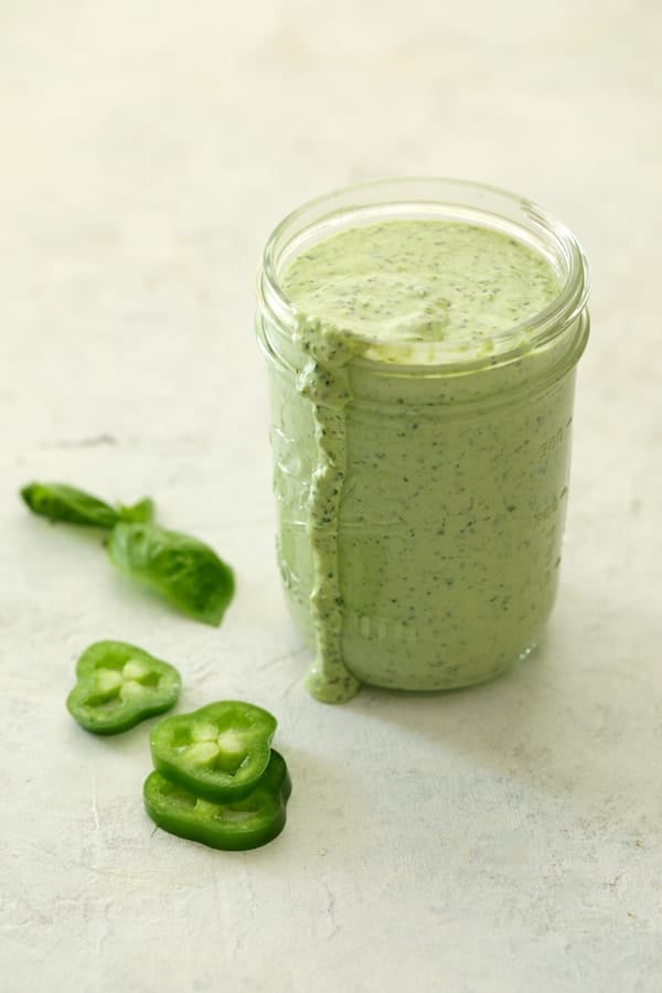 Photo of Spicy Pesto Aioli in glass jar.