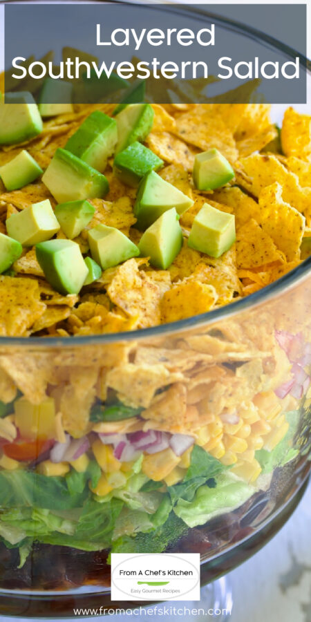 Layered Southwestern Salad in glass bowl.