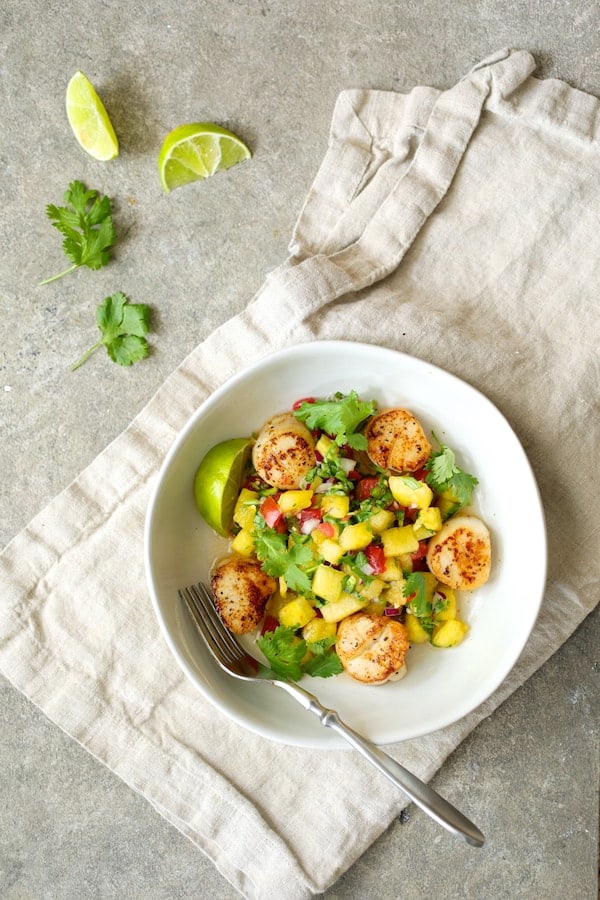 Seared Sea Scallops with Watermelon Tomato Salsa - Overhead shot of seared scallops in white bowl with watermelon salsa
