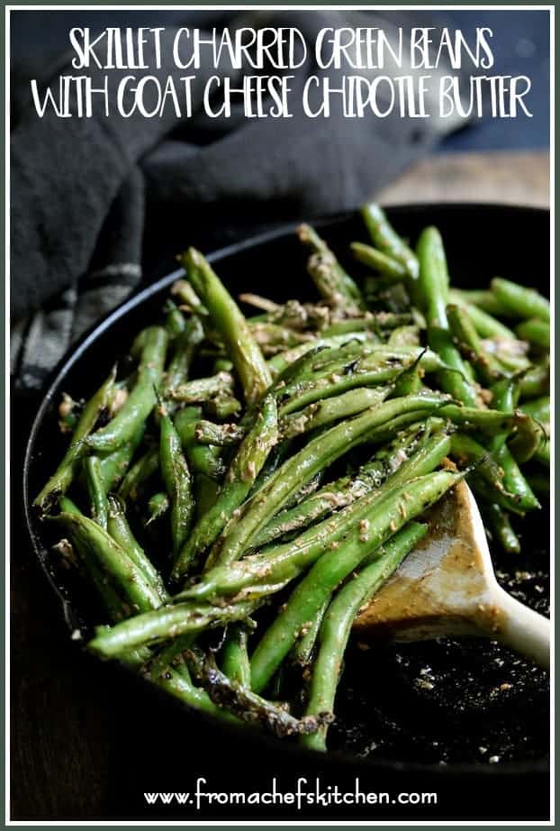 Pinterest graphic for Skillet Charred Green Beans with Goat Cheese showing it in a cast iron skillet being stirred with wooden spoon.
