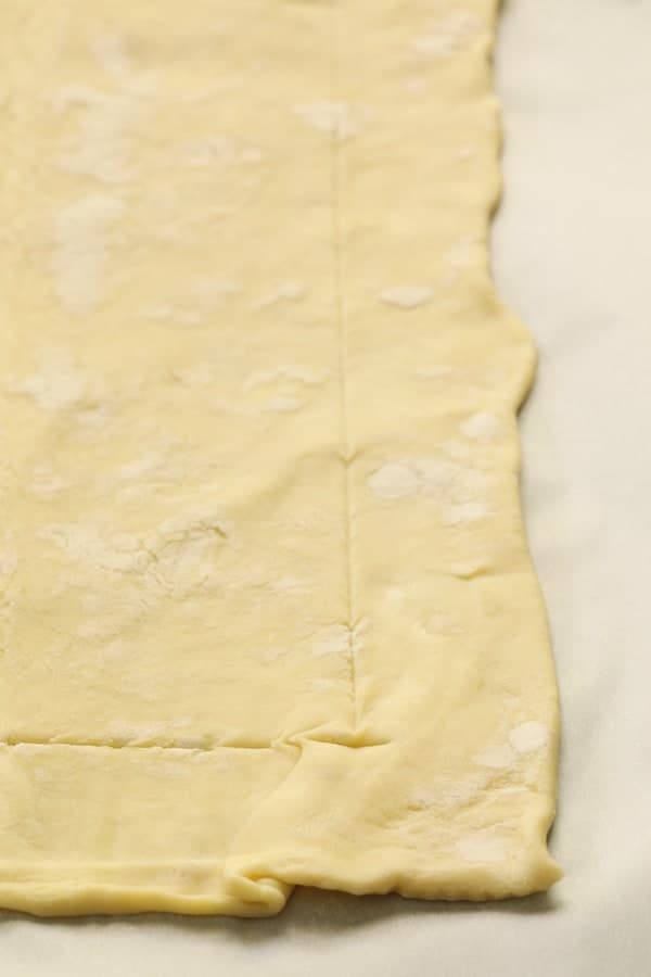 Photo of how to score puff pastry crust before baking.