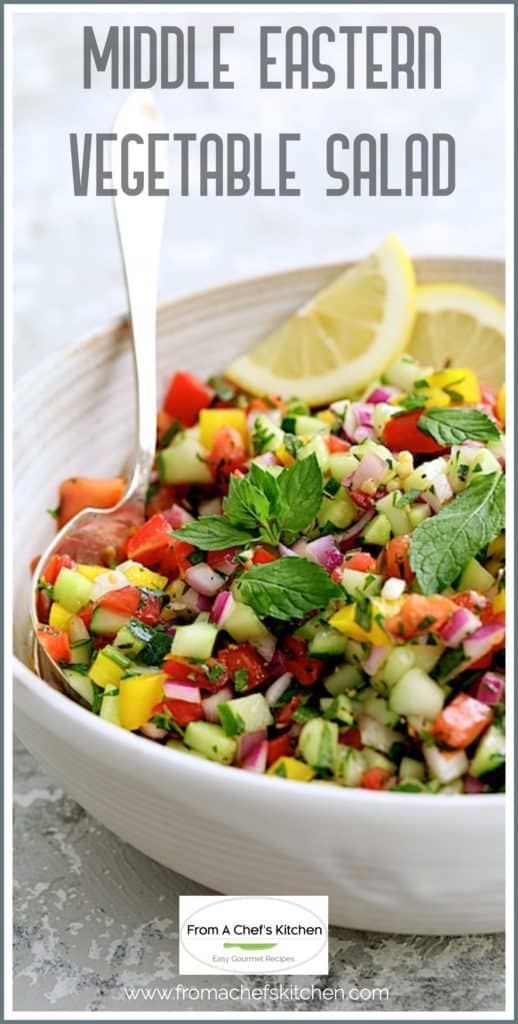 Pinterest graphic for Middle Eastern Vegetable Salad showing it in a white bowl with serving spoon.