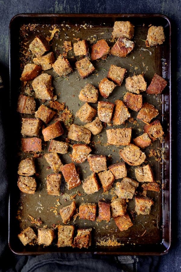 Photo of whole-grain croutons on baking sheet.
