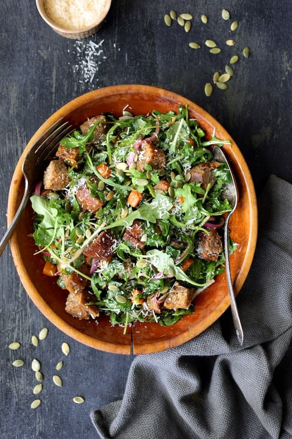 Photo of Autumn Panzanella after being combined with cheese in wood bowl.