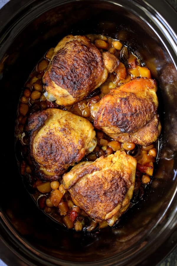 Photo of Moroccan Chicken Tagine with Butternut Squash Chickpeas and Olives in slow cooker after being cooked.