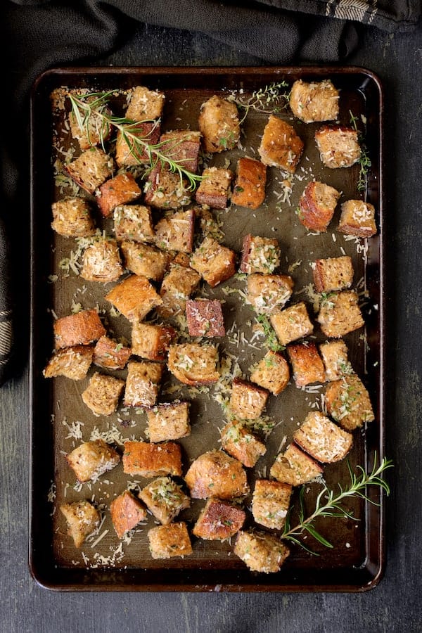 Photo of croutons on baking sheet before being baked.