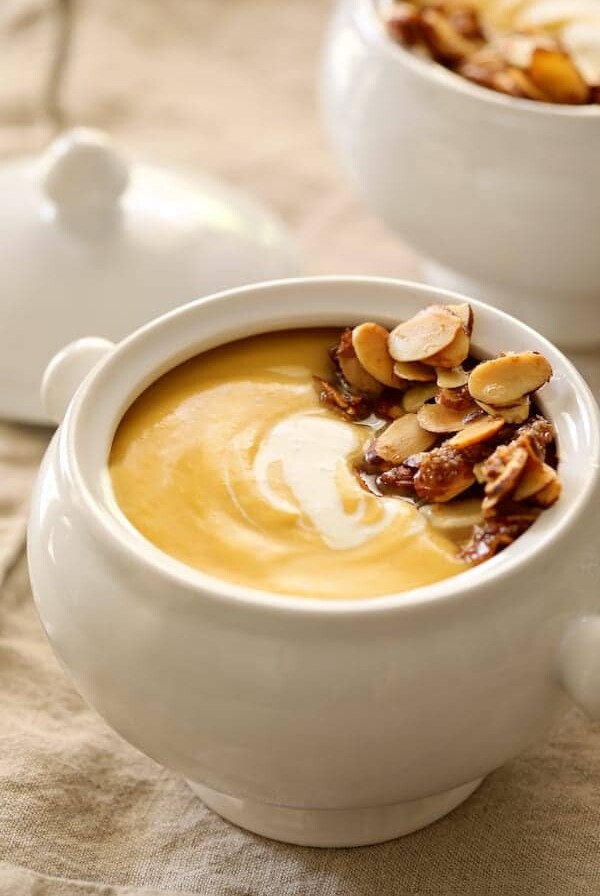 Pumpkin Soup with Marsala and Mascarpone in bowl with almond topping.