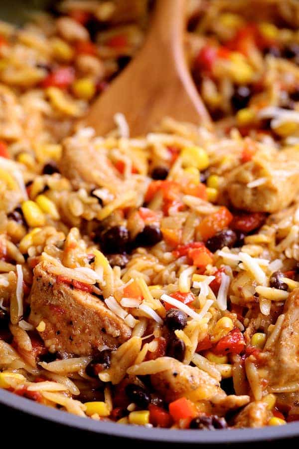 Close-up photo of Southwestern Chicken Orzo and Black Bean Skillet.