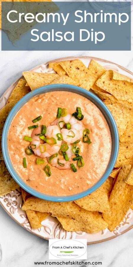 Pinterest graphic for Creamy Shrimp Salsa Dip showing it in a bright blue bowl on a platter with tortilla chips.