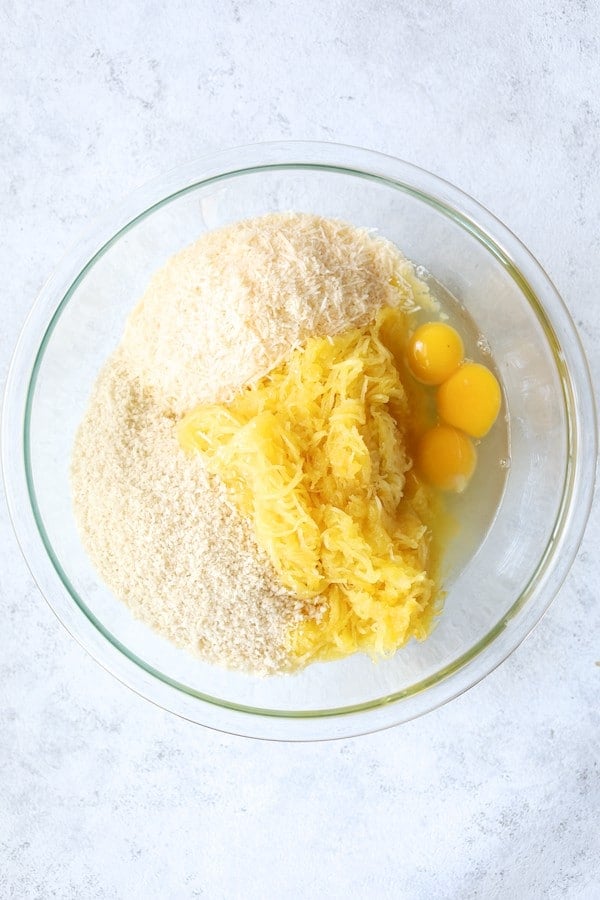 Photo of ingredients for Spaghetti Squash Fries in glass bowl.