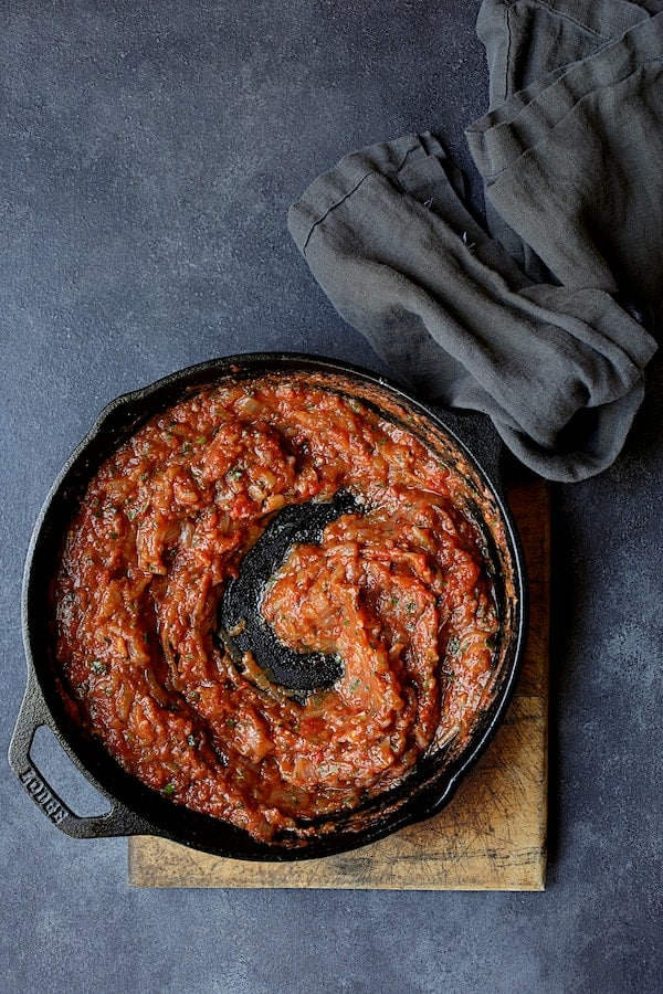Photo of tomato sauce in cast iron skillet.
