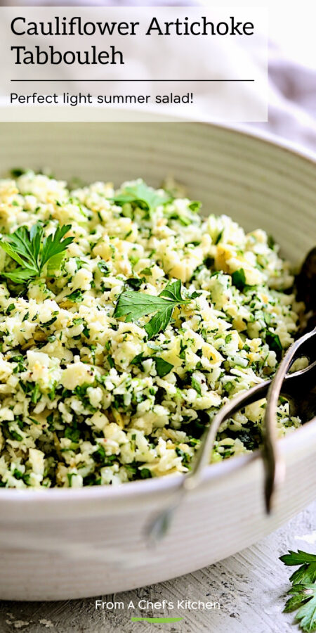 Pinterest graphic for Cauliflower Artichoke Tabboule showing it in a white serving bowl with serving utensils.