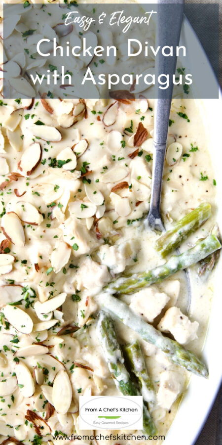 Chicken Divan with Asparagus in oval baking dish with serving spoon.