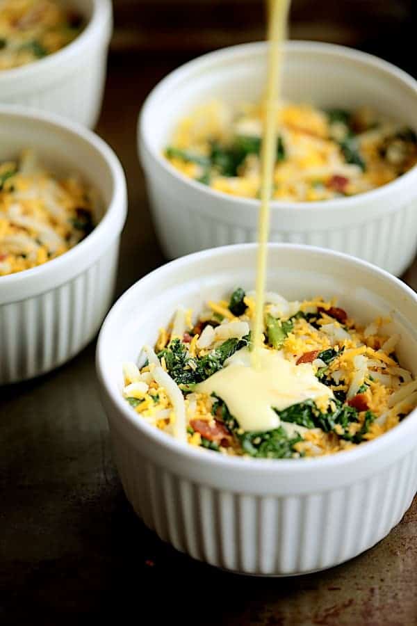Photo of custard being poured into frittatas.
