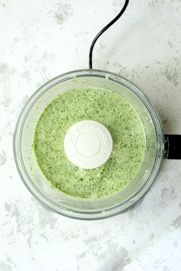 Overhead shot of Cilantro Coconut Sauce in food processor